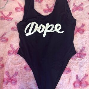 “Dope”black bodysuit with white word print. Size M